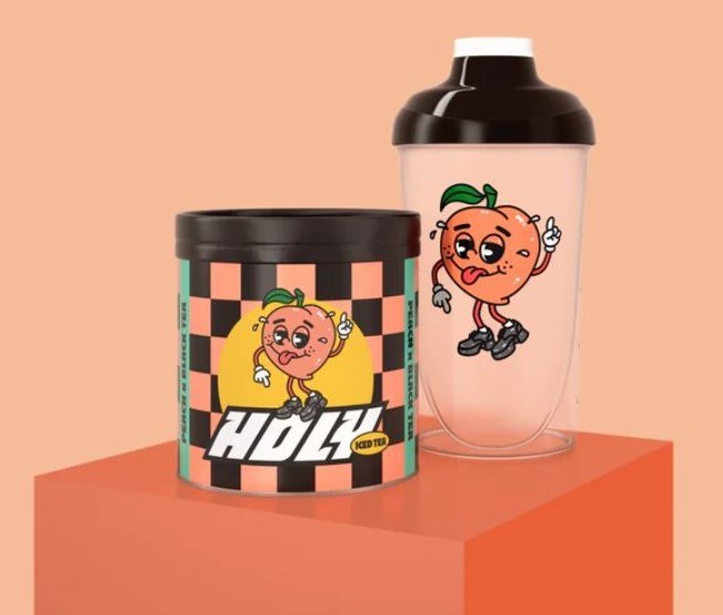 Shaker transparent et boîte Holy Iced Tea parfum pêche avec personnage illustré